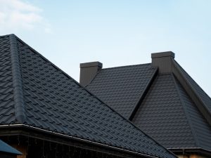 a well maintained roof with dark roof coating colour